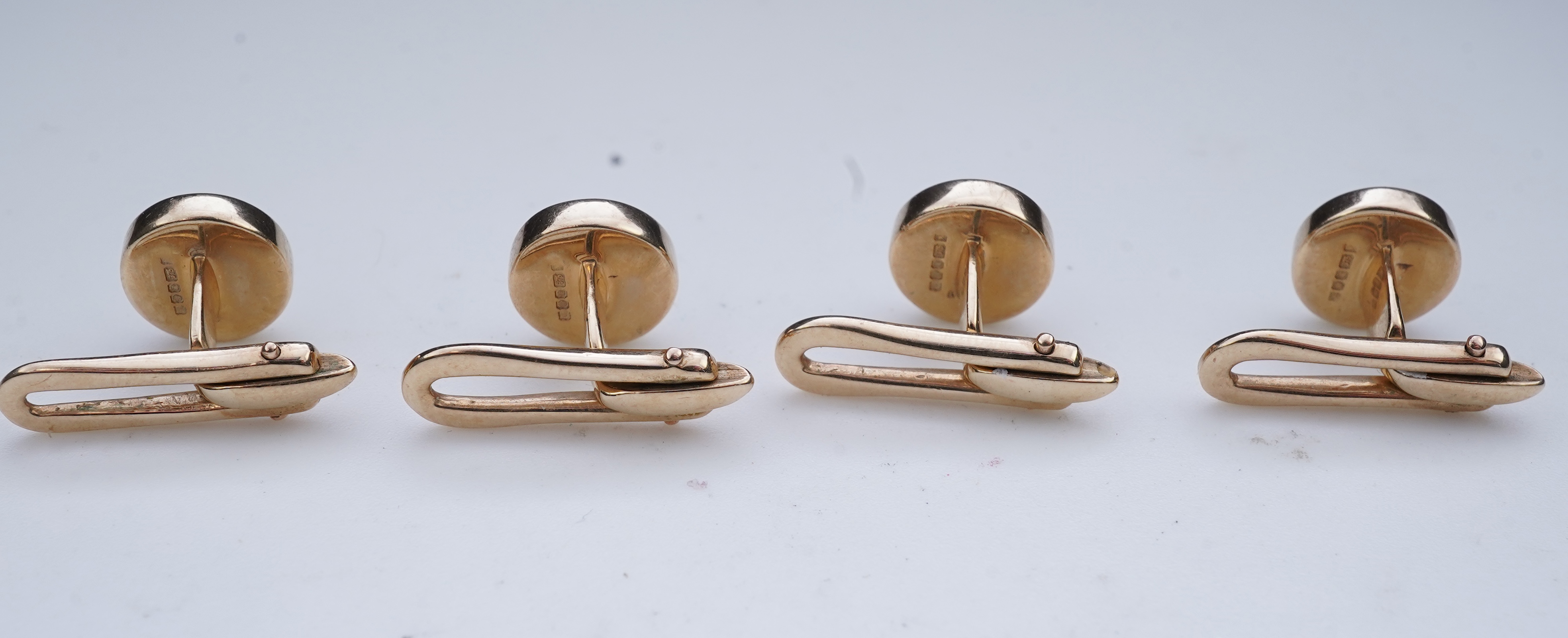 A mother of pearl and diamond dress set